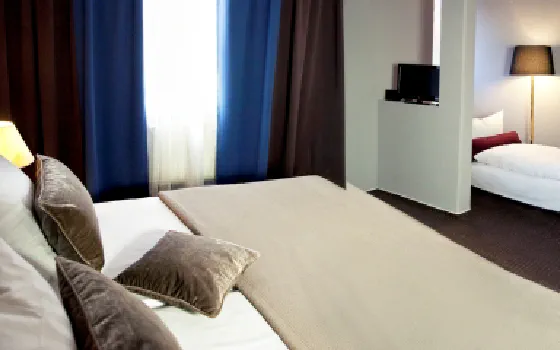 Dreibettzimmer mit drei Schlafplätzen